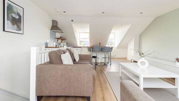 Apartment, Balcony | Living area | 32-inch flat-screen TV with cable channels, Netflix, streaming services