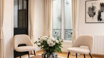 Apartment, Courtyard View | Living area | 80-cm Smart TV with digital channels