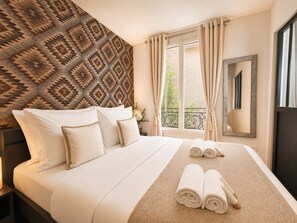 Apartment, Courtyard View | Iron/ironing board, travel crib, free WiFi, bed sheets