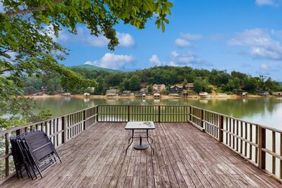 Lakefront cabin at Lake Lure with grill, boathouse, dock & porch
