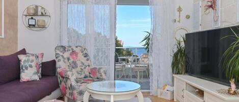Apartment (Two Bedroom Apartment With Balcony An) | Living room | 32-inch flat-screen TV with satellite channels