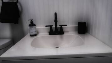 Hair dryer, towels, soap, toilet paper