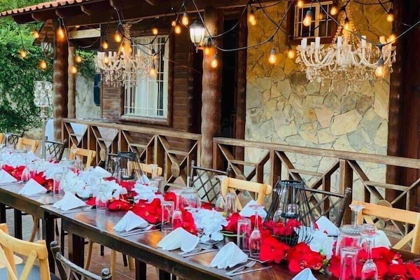 Cabaña Deluxe, vista al jardín | Terraza o patio