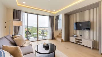 Duplex 2 Bedroom Suite Golf View | Living area | 43-inch flat-screen TV with digital channels