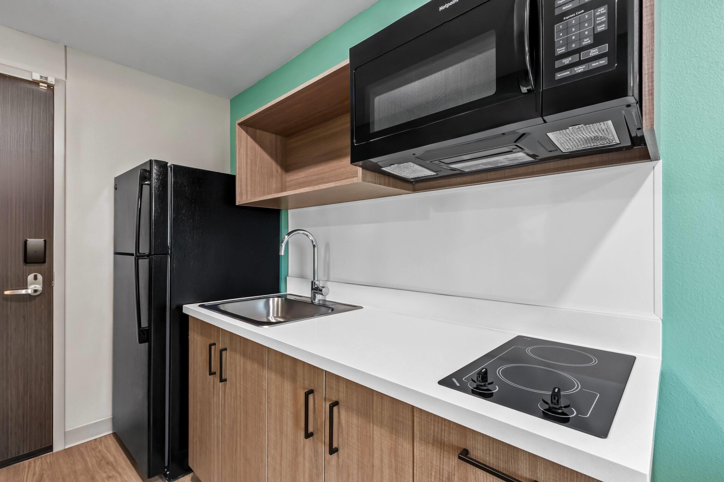 Suite, 1 Queen Bed, Non Smoking | Desk, laptop workspace, blackout curtains, free WiFi