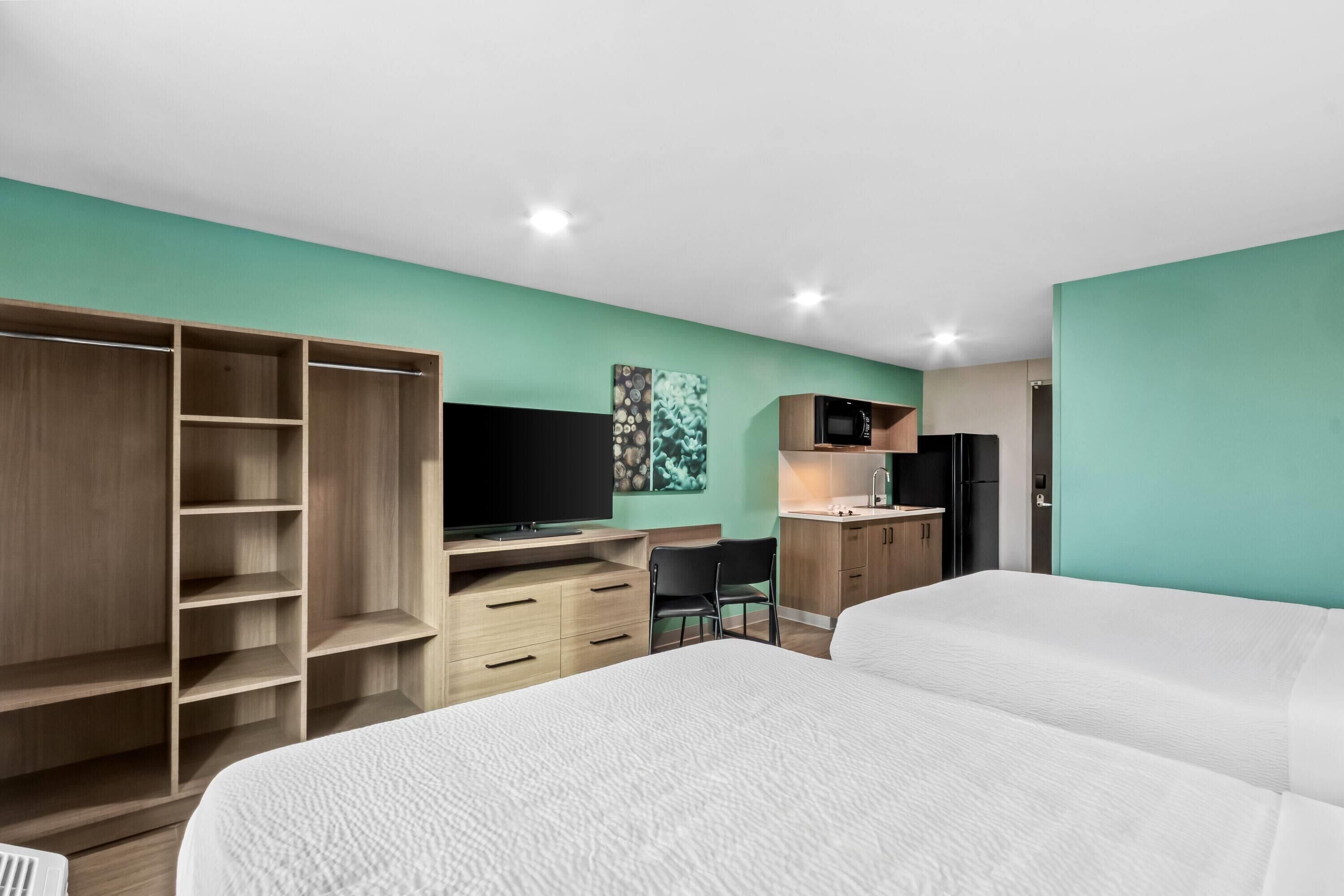 Suite, 2 Queen Beds, Non Smoking | Desk, laptop workspace, blackout curtains, free WiFi