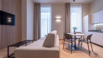 Suite superior | Área de sala de estar