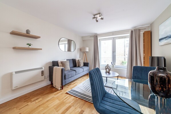 Apartment | Living area | 32-inch flat-screen TV with cable channels, Netflix, streaming services