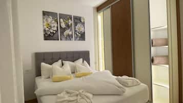 2 habitaciones, tabla de planchar con plancha, wifi y ropa de cama