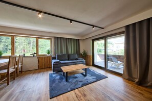 Comfort Apartment, 2 Bedrooms, Mountain View | Living area | 50-inch flat-screen TV with cable channels - Apartment Westside Top 9 (Saalbach)