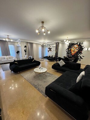 Living area - Charming 3-bedroom apartment with AC, WiFi in delightful Giza Governorate (Giza Governorate)