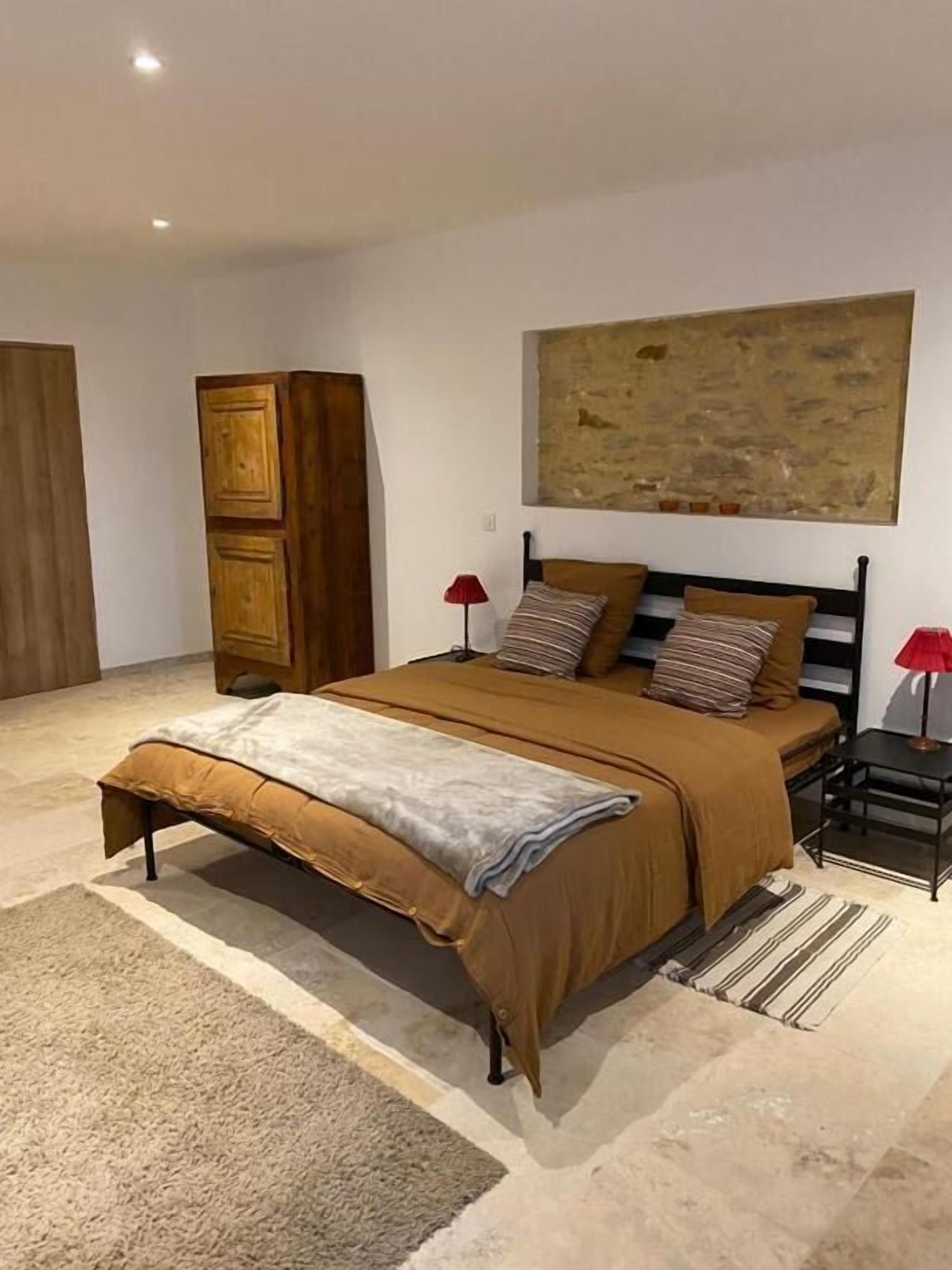 Suite Deluxe, balcón, vistas al patio | Cortinas opacas y sistema de insonorización