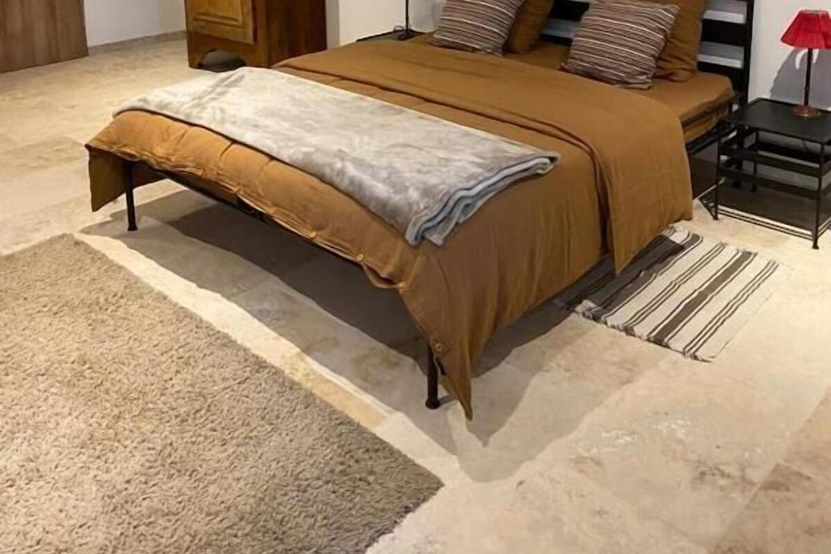 Suite Deluxe, balcón, vistas al patio | Cortinas opacas y sistema de insonorización