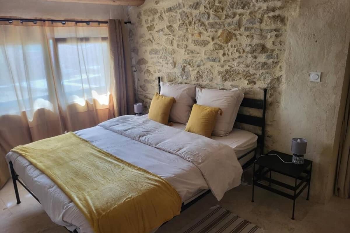 Deluxe Suite, Patio, Pool View | Blackout drapes, soundproofing, iron/ironing board, free WiFi