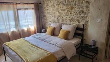 Deluxe Suite, Patio, Pool View | Blackout curtains, soundproofing, iron/ironing board, free WiFi