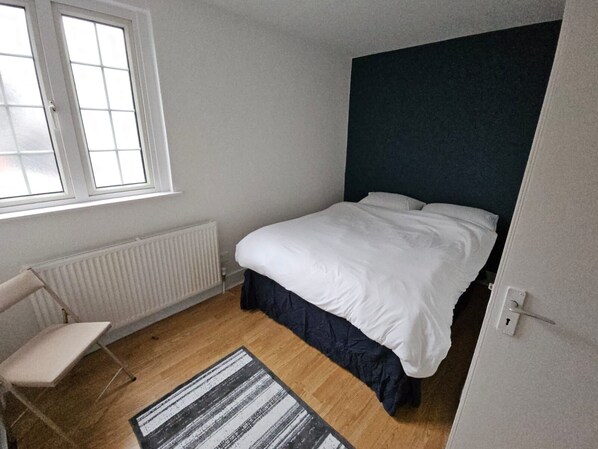2 dormitorios, tabla de planchar con plancha, wifi gratis y ropa de cama