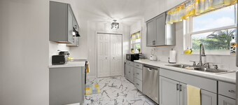 Family‑friendly 4‑bedroom home accommodating multiple boats with trailers