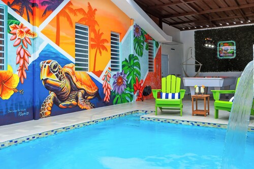 Retro Resort-Style Home w/ Pool, Theater, Game Room, Mini Golf and & More