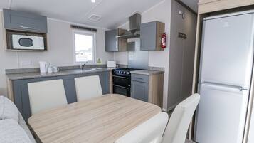 Fridge, microwave, toaster, cookware/dishes/utensils