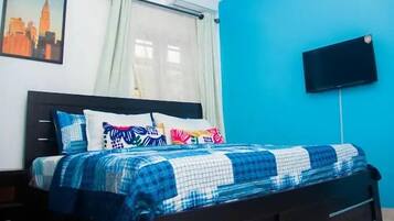 Family Apartment, Balcony, City View | In-room safe, desk, laptop workspace, blackout curtains