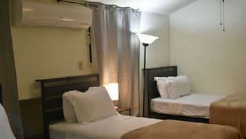Standard Triple Room | Laptop workspace, iron/ironing board, free WiFi, bed sheets