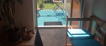 Quiet apartment with a view of the Inn, for a cozy stay.