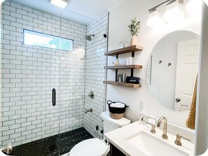 Shower, hair dryer, towels, soap