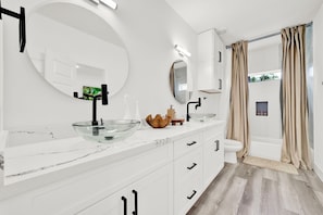Hair dryer, towels, soap, toilet paper