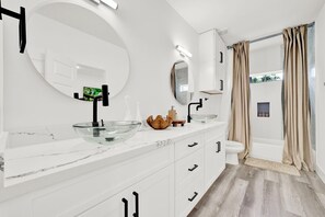 Hair dryer, towels, soap, toilet paper