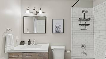 Hair dryer, towels, soap, shampoo