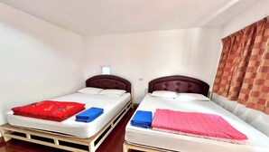 Two single beds with headboards, white bedding, and a red and blue blanket on the left bed. - Chalalai Resort Kham Chanot By Zuzu (Ban Dung)