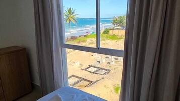 Deluxe Apartment, Sea View | Laptop workspace, blackout curtains, free WiFi