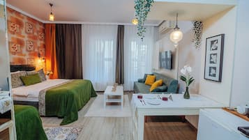 Suíte estúdio executiva | Escrivaninha, ferros/tábuas de passar roupa, berços grátis