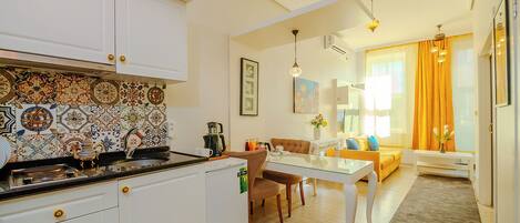 Superior Apartment | Desk, iron/ironing board, free cots/infant beds, rollaway beds