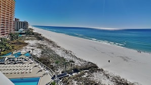 A beachside hotel with a pool, beach access, and ocean views. - Dunes of Panama D by Resort Collection (Panama City Beach)