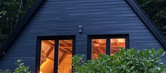 Between land and sea, an unusual cottage in a rural setting