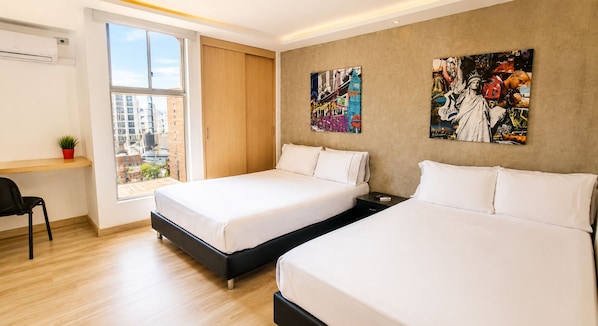 A modern hotel room with two beds, a desk, and a large window.