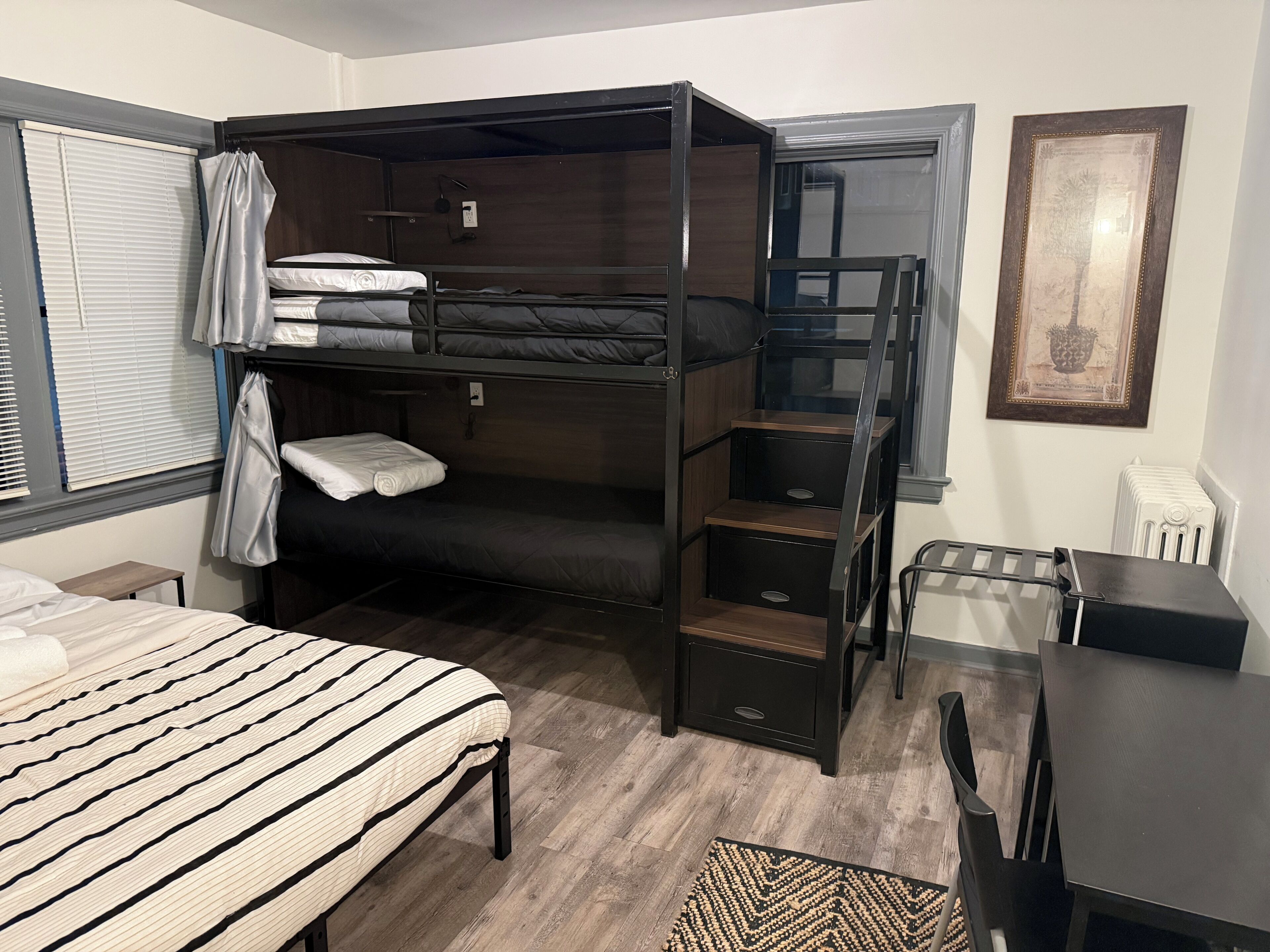 Deluxe Quadruple Room | Premium bedding, free WiFi, bed sheets