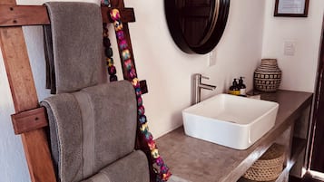 Single Room, 1 Queen Bed | Bathroom | Shower, rainfall showerhead, towels, soap