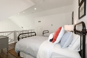 4 bedrooms, desk, iron/ironing board, travel crib