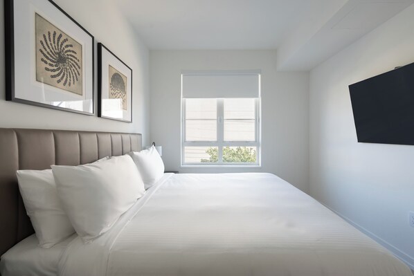 2 chambres, coffres-forts dans les chambres, fer et planche à repasser