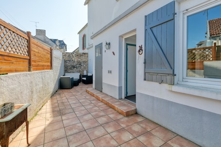 Terrasse/Patio. Maison de vacances 'Maison De Famille Paisible' avec terrasse privée et Wi-Fi
