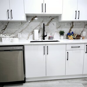 Microwave, oven, stovetop, dishwasher - Welcome to this cozy 2 bedroom brand new home nestled in the beautiful Nisku are (Nisku)