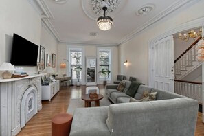 Smart TV, fireplace, books