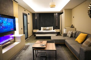 Basic Studio | Living area | 64-inch TV with digital channels, fireplace - LIMONOTTO SUIT OTEL (Mersin)