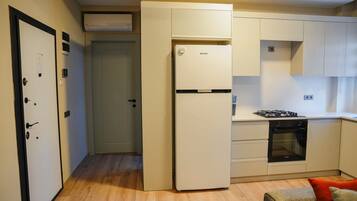 Suite Deluxe | Cucina privata | Frigorifero