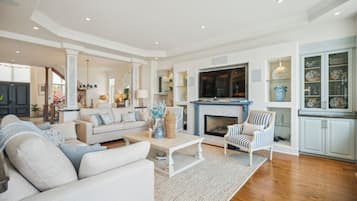 Smart TV, fireplace, books