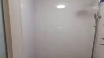 Shower, bidet, towels, soap