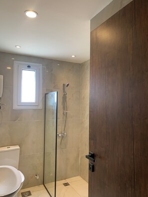 Shower, jetted tub, towels, soap