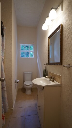 Hair dryer, towels, soap, toilet paper